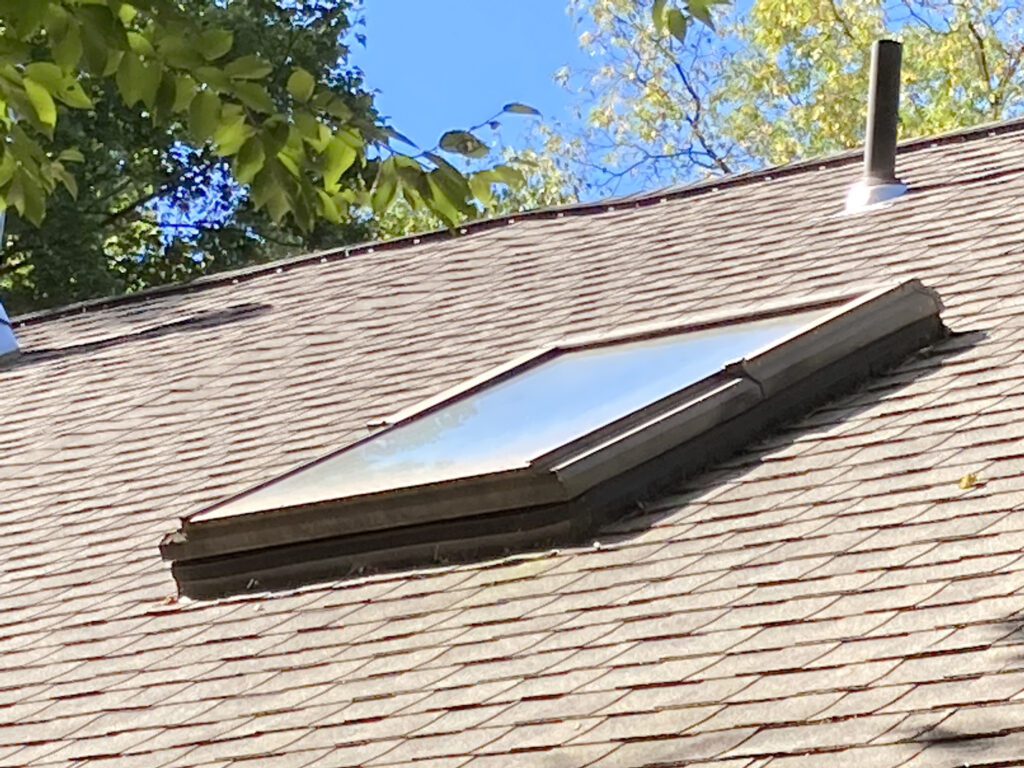 Asphalt shingle roof and skylight in Berkshire County