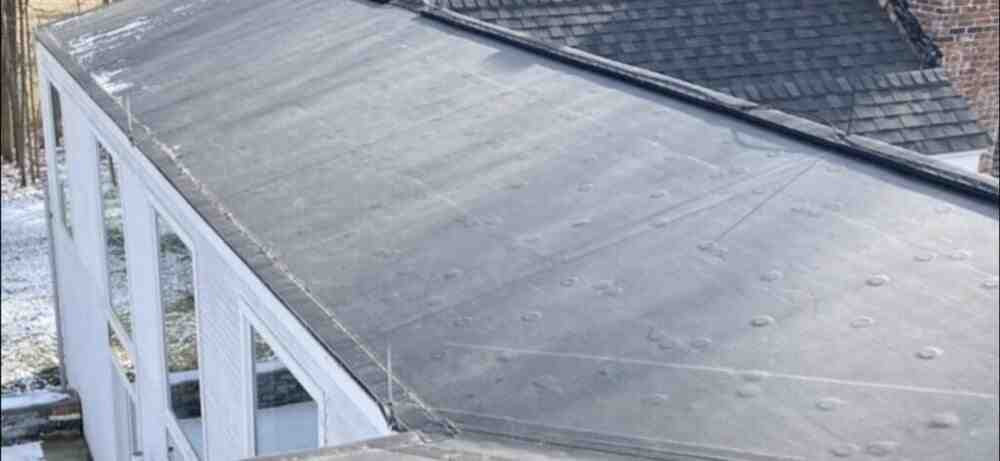 The Cozy Cover-Up: Mastering Residential Flat Roof Insulation